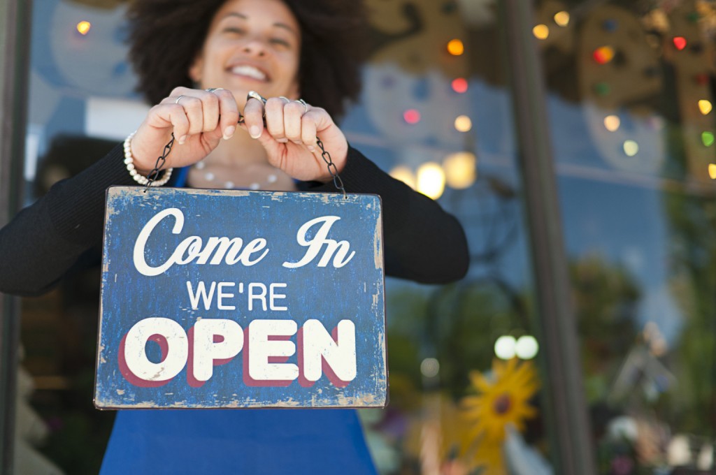 Woman with Open Sign