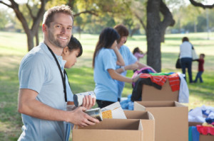 Business volunteers giving back to their local community by donating goods