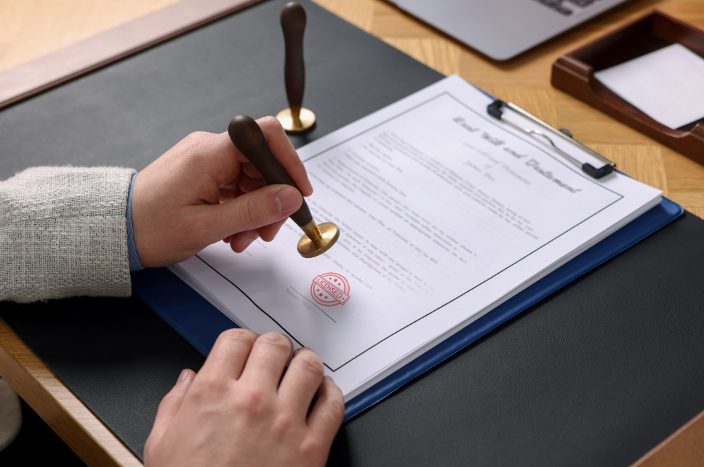 Business owner reviewing business license and permit applications